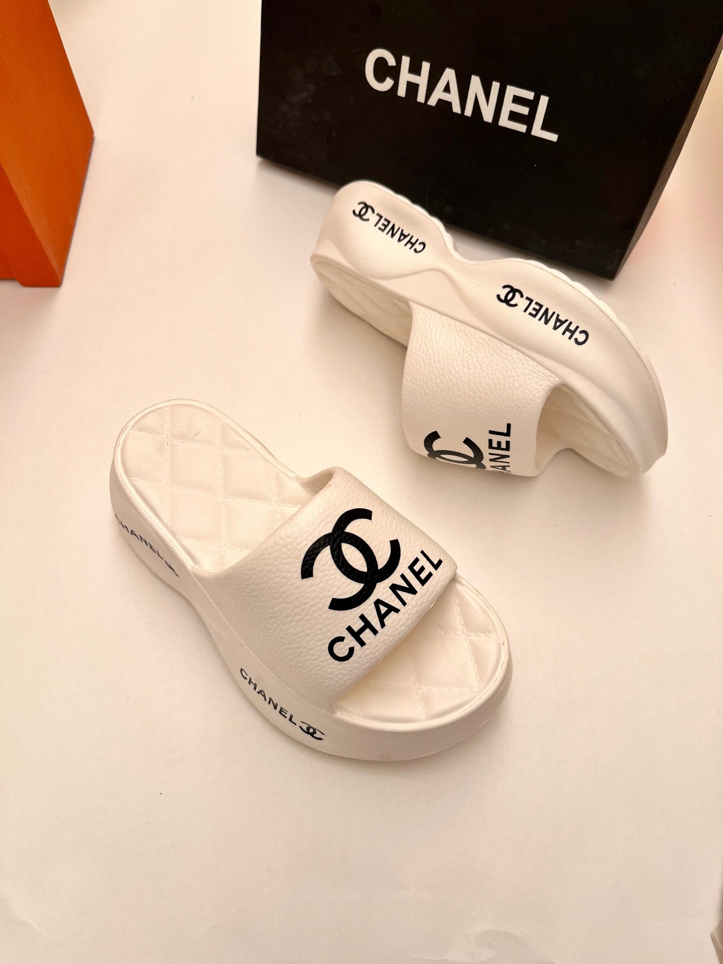 CHANEL IMPORTED PLATFORM FLIPFLOPS