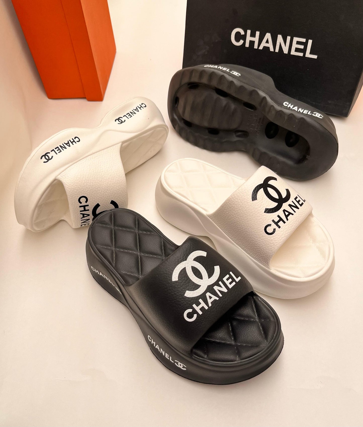 CHANEL IMPORTED PLATFORM FLIPFLOPS