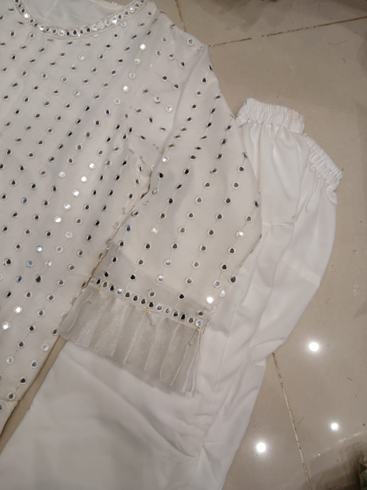 ERUM KHAN STITCHING CHARGES