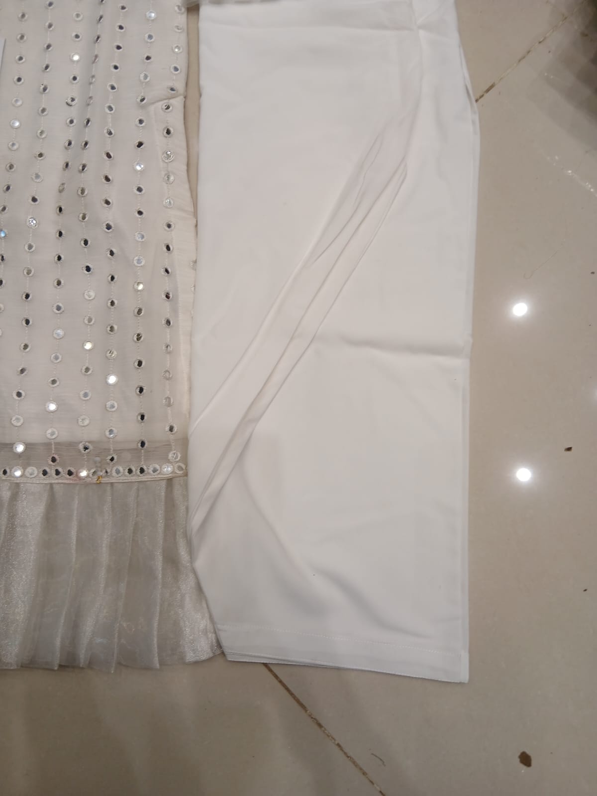 ERUM KHAN STITCHING CHARGES