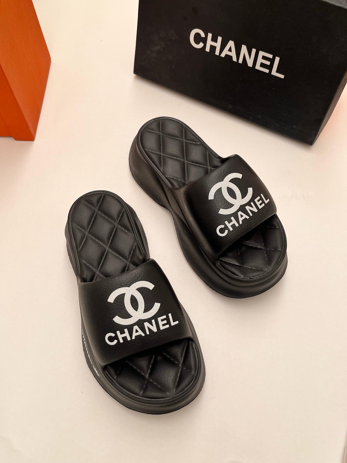 CHANEL IMPORTED PLATFORM FLIPFLOPS