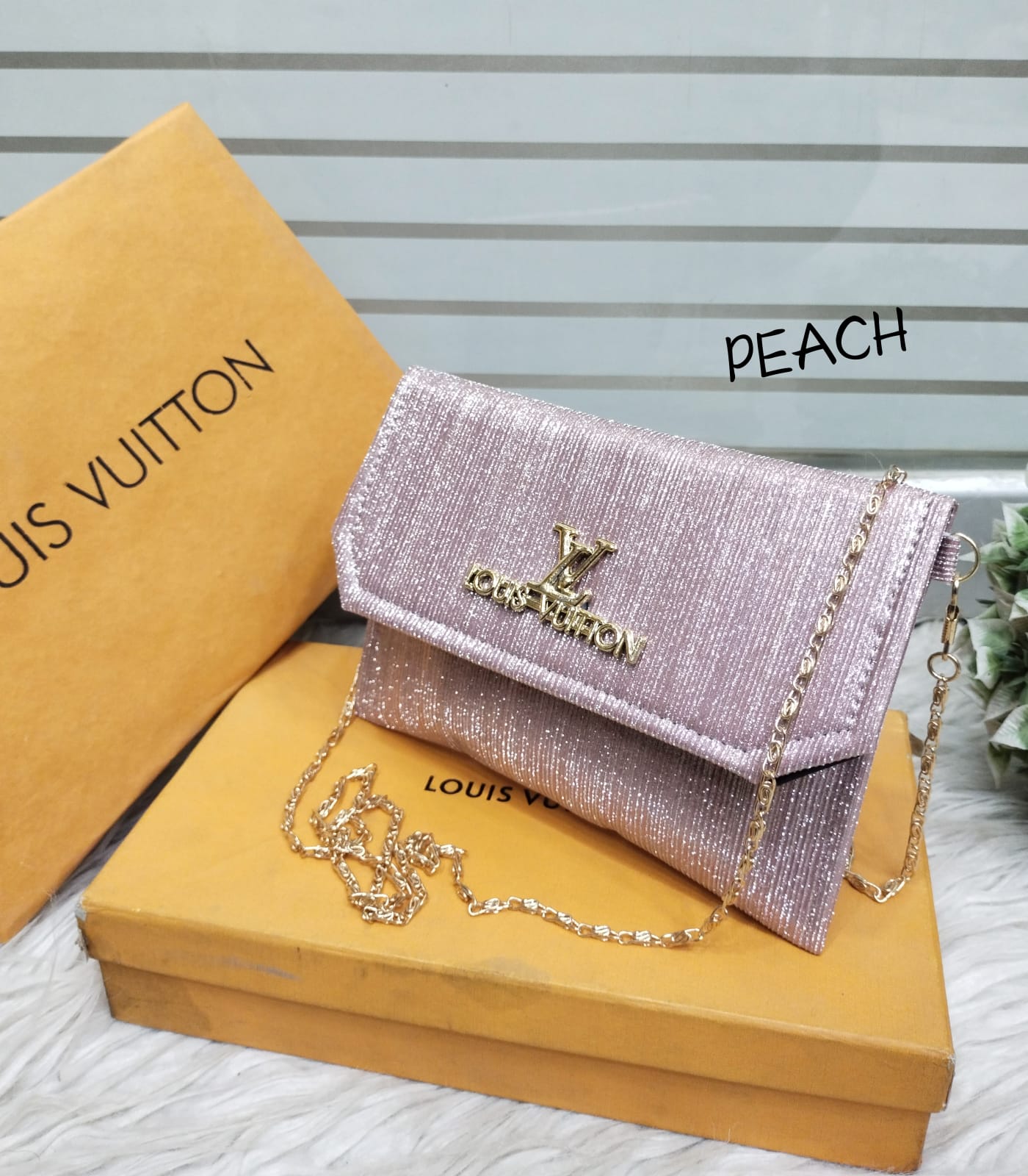 LV hand clutch crossbody For kidz