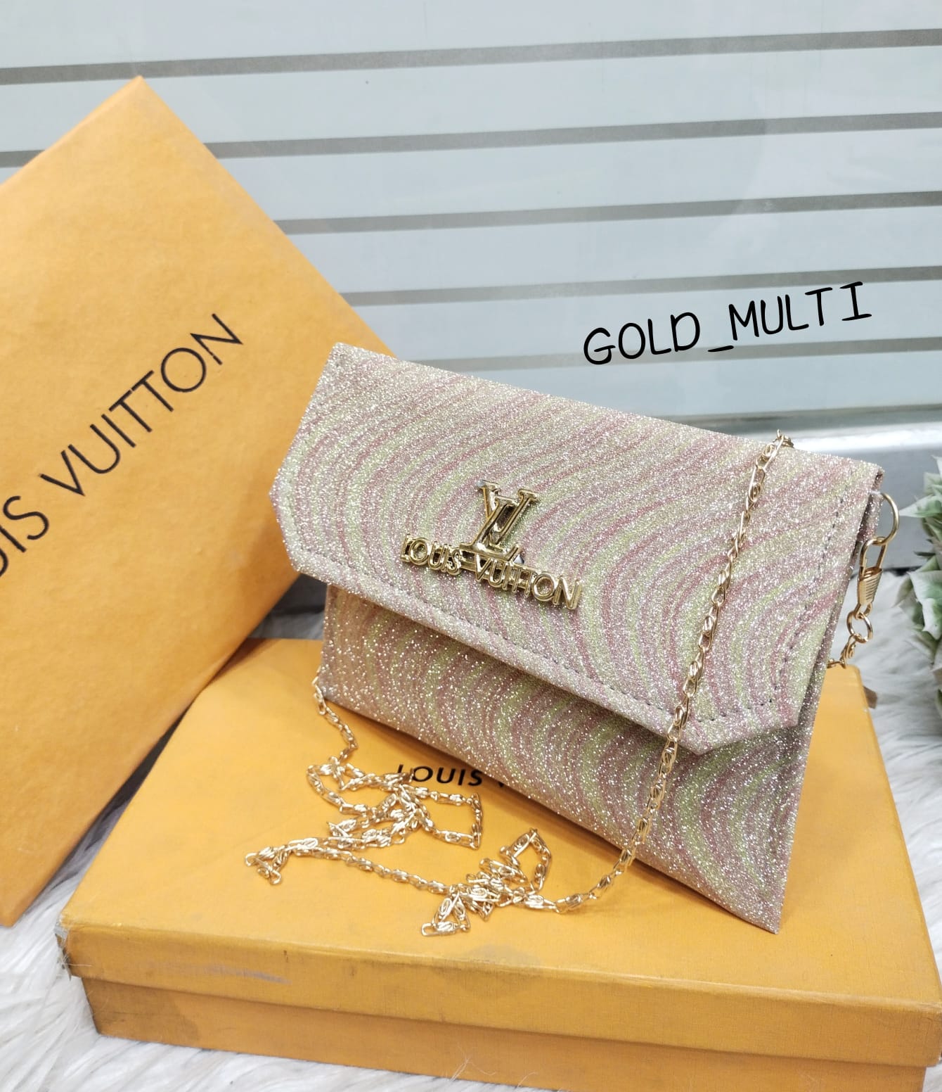 LV hand clutch crossbody For kidz