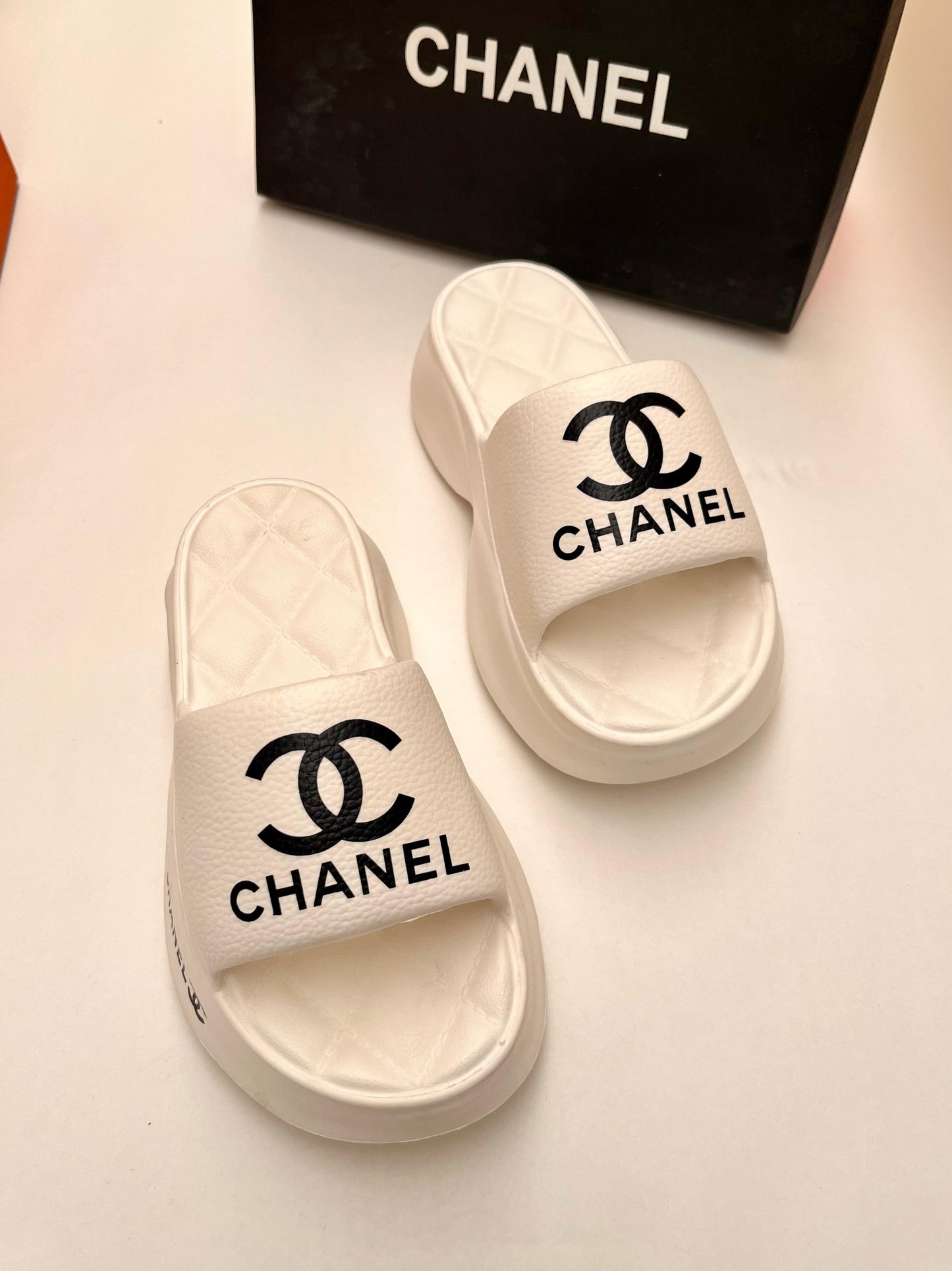 CHANEL  IMPORTED PLATFORM FLIPFLOPS