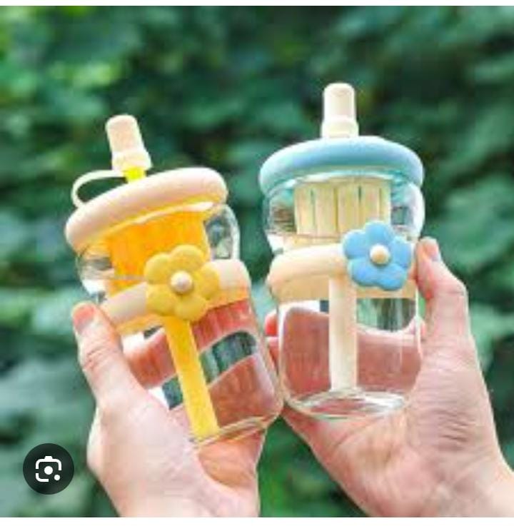 Drinking glass with straw Stopper