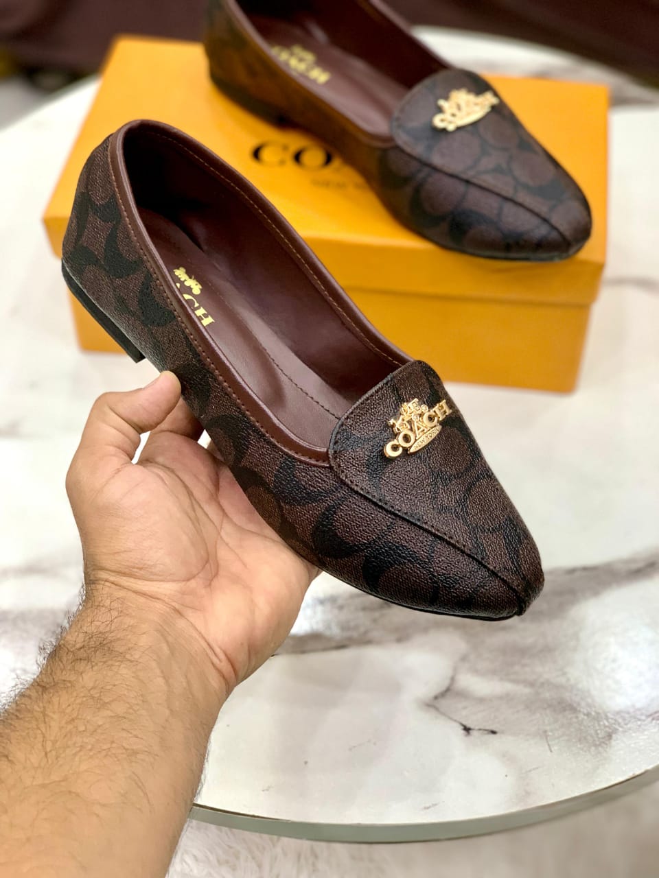 Coach pumps