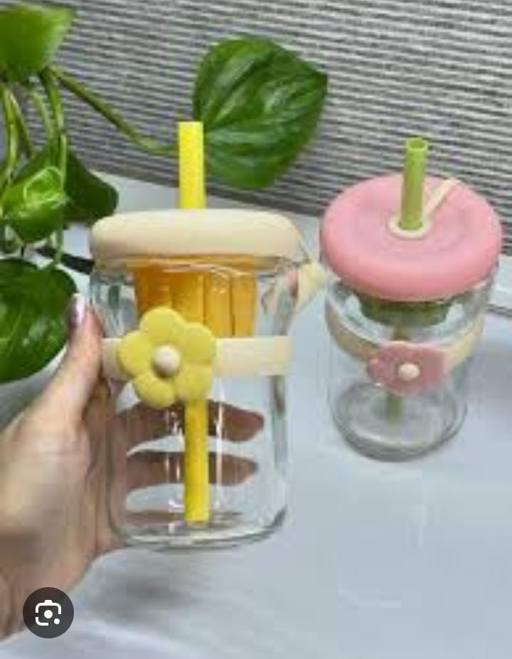 Drinking glass with straw Stopper