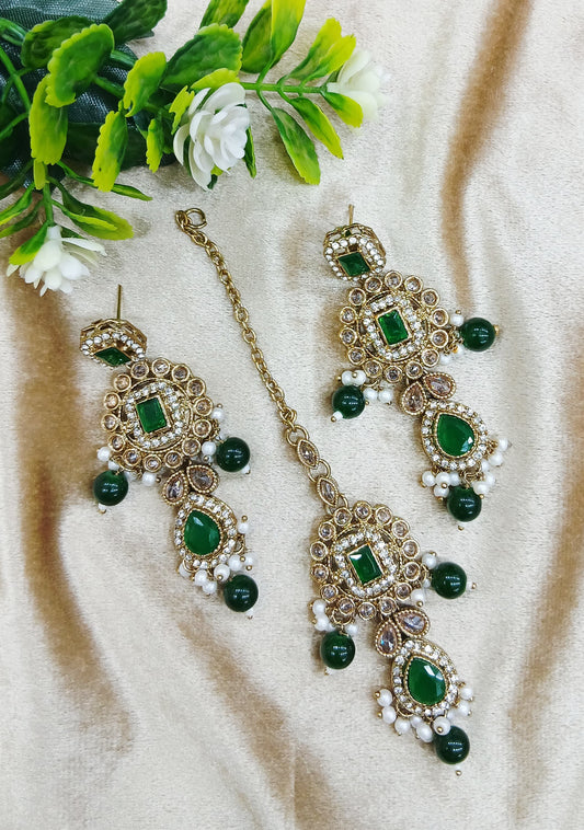 Long earrings and tika