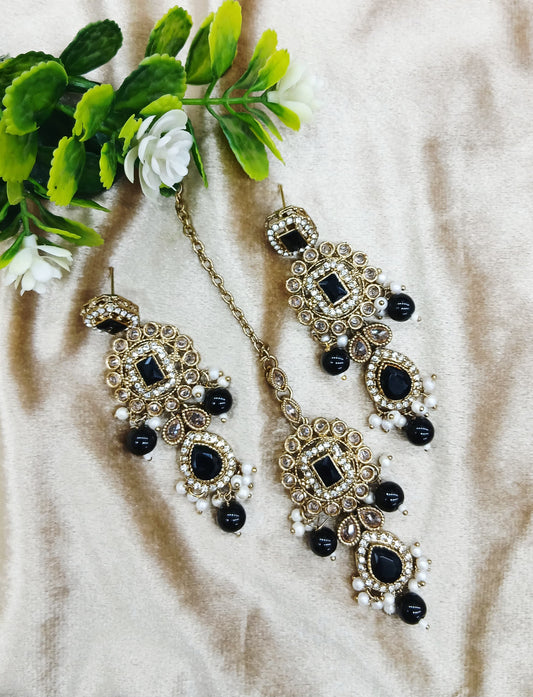 Long earrings and tika