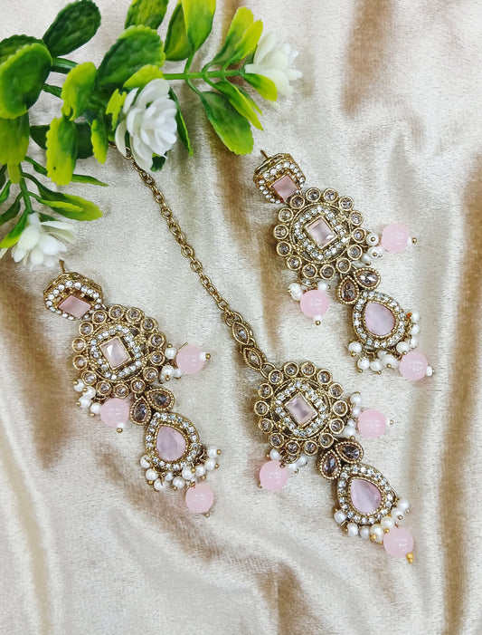 Long earrings and tika